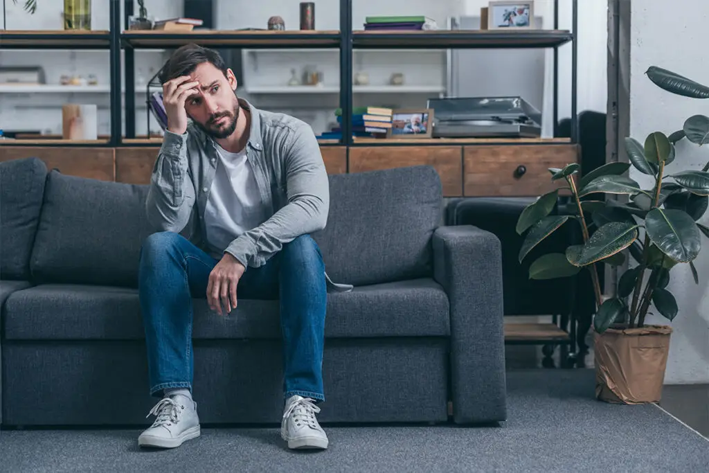 Thinking Man on Couch